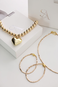 GROUNDED IN GOLD